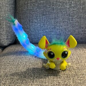 Lil Gleemerz Colorful Interactive Toy with Light-Up Tail